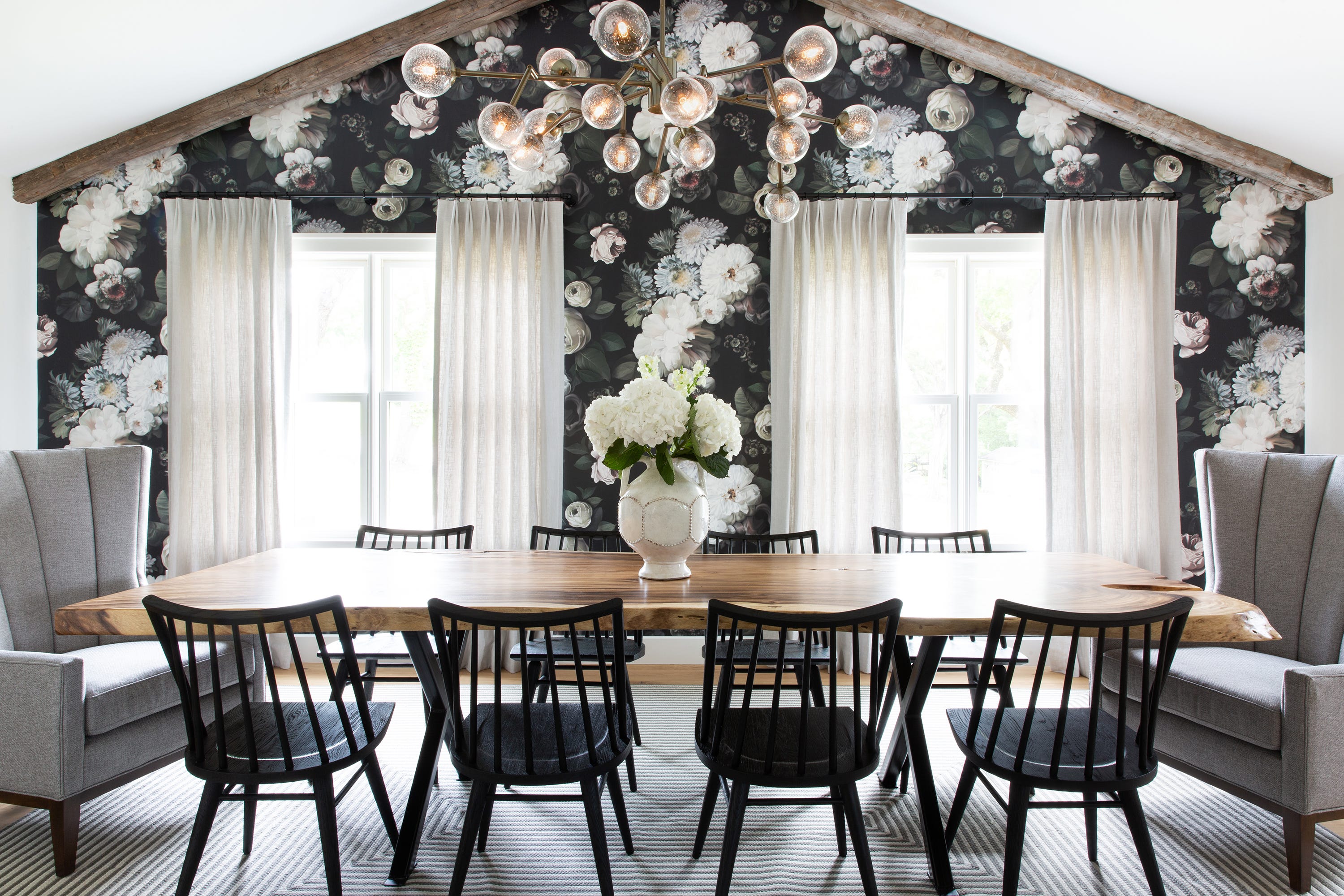 Dark floral wallpaper in contemporary dining room